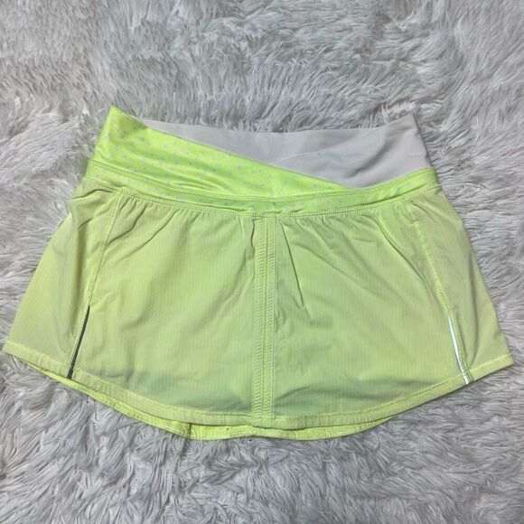 lululemon athletica Dresses & Skirts - Lululemon Skirt Skort Size 4 Neon Green Built in Shorts Stretchy Mini Rare Find
